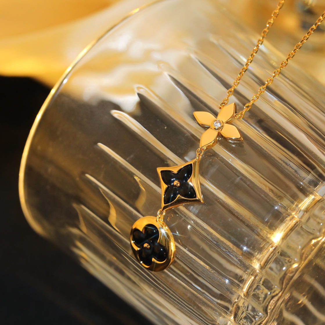 ¡®Lumi¡¯STAR AND SUN ONYX ROSA GOLD KETTE
