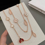 Lumi® Glücksfrühling Halskette mit 15 Motiven in Roségold