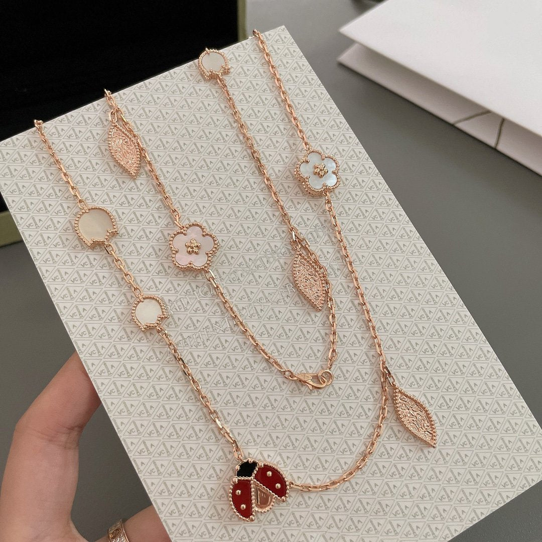 Lumi® Glücksfrühling Halskette mit 15 Motiven in Roségold
