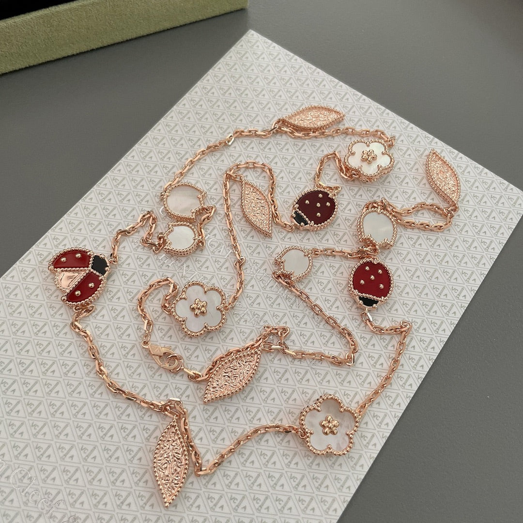 Lumi® Glücksfrühling Halskette mit 15 Motiven in Roségold