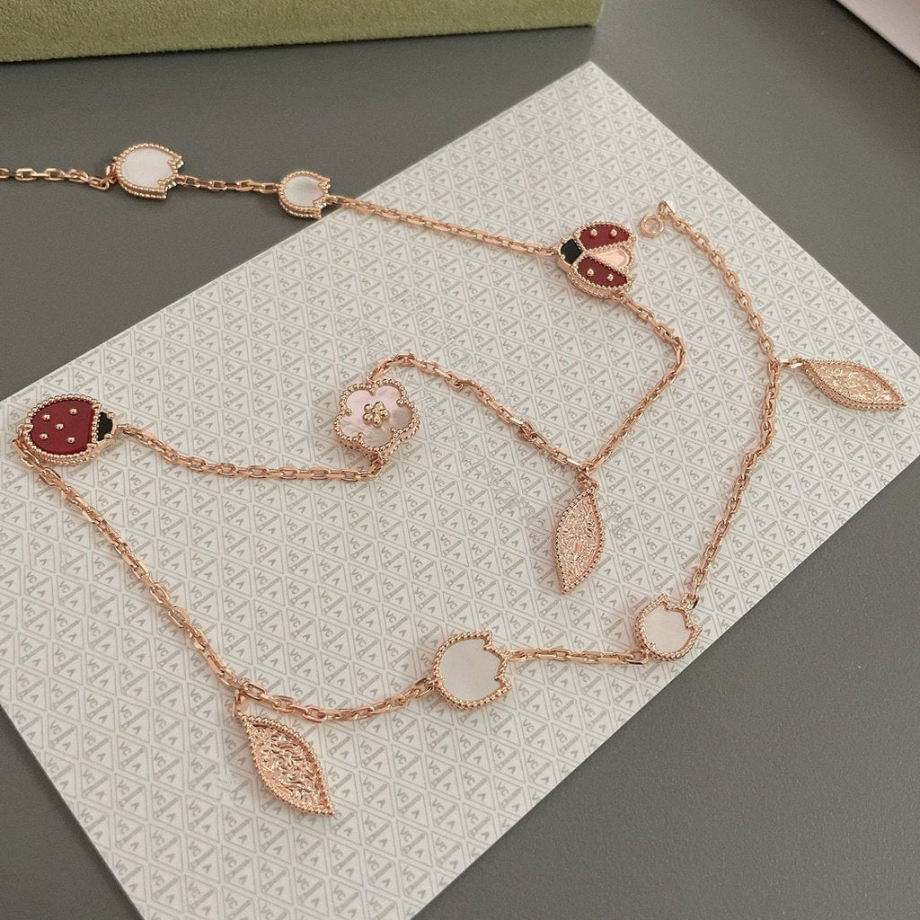 Lumi® Glücksfrühling Halskette mit 15 Motiven in Roségold
