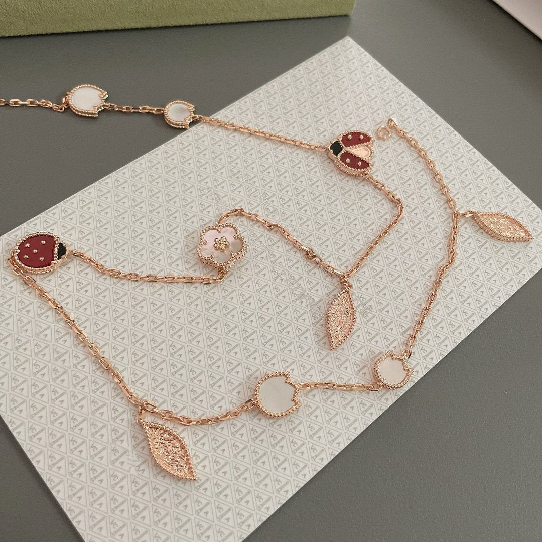 Lumi® Glücksfrühling Halskette mit 15 Motiven in Roségold