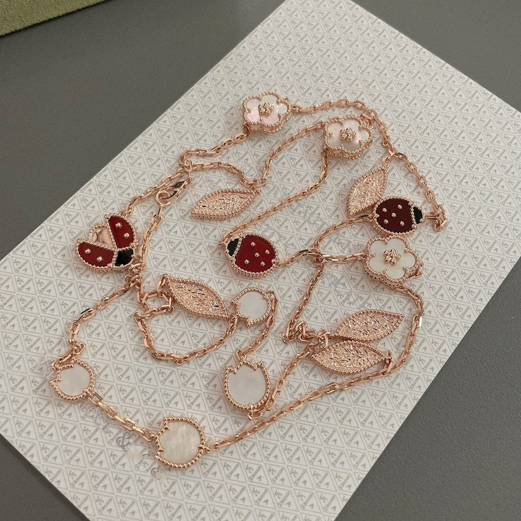 Lumi® Glücksfrühling Halskette mit 15 Motiven in Roségold