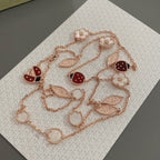 Lumi® Glücksfrühling Halskette mit 15 Motiven in Roségold