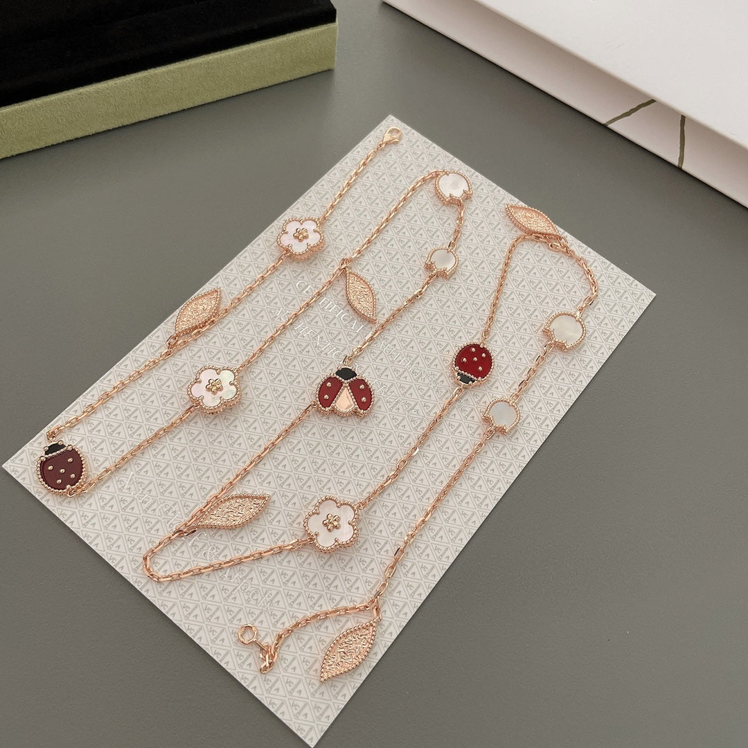 Lumi® Glücksfrühling Halskette mit 15 Motiven in Roségold