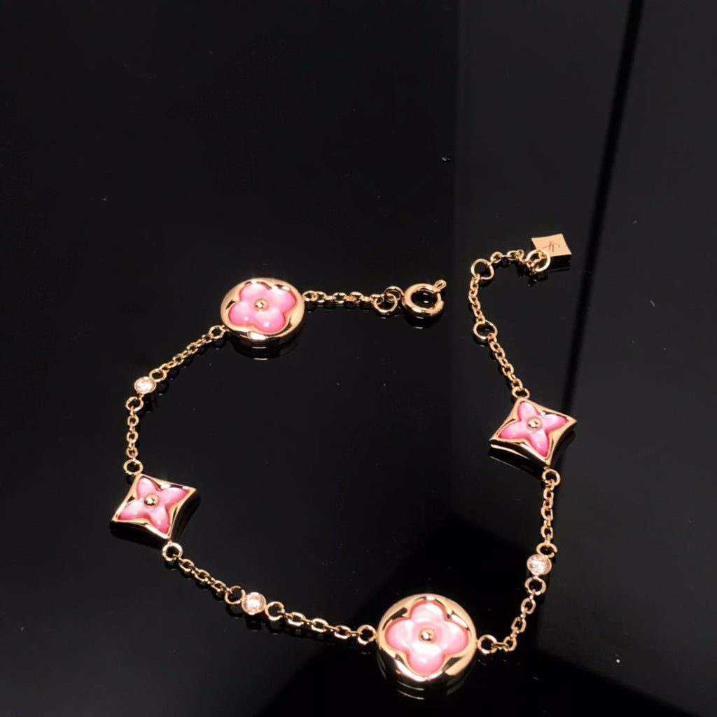 Lumi® Armband mit Stern und Sonne, 4 Motive, rosa Mopp, rosa Gold 