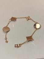 Lumi® Armband mit Stern und Sonne, 5 Motive, rosa-goldenes Armband