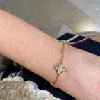 Lumi® Armband mit Stern und Sonne, 4 Motive, weiß, rosa, goldfarben 