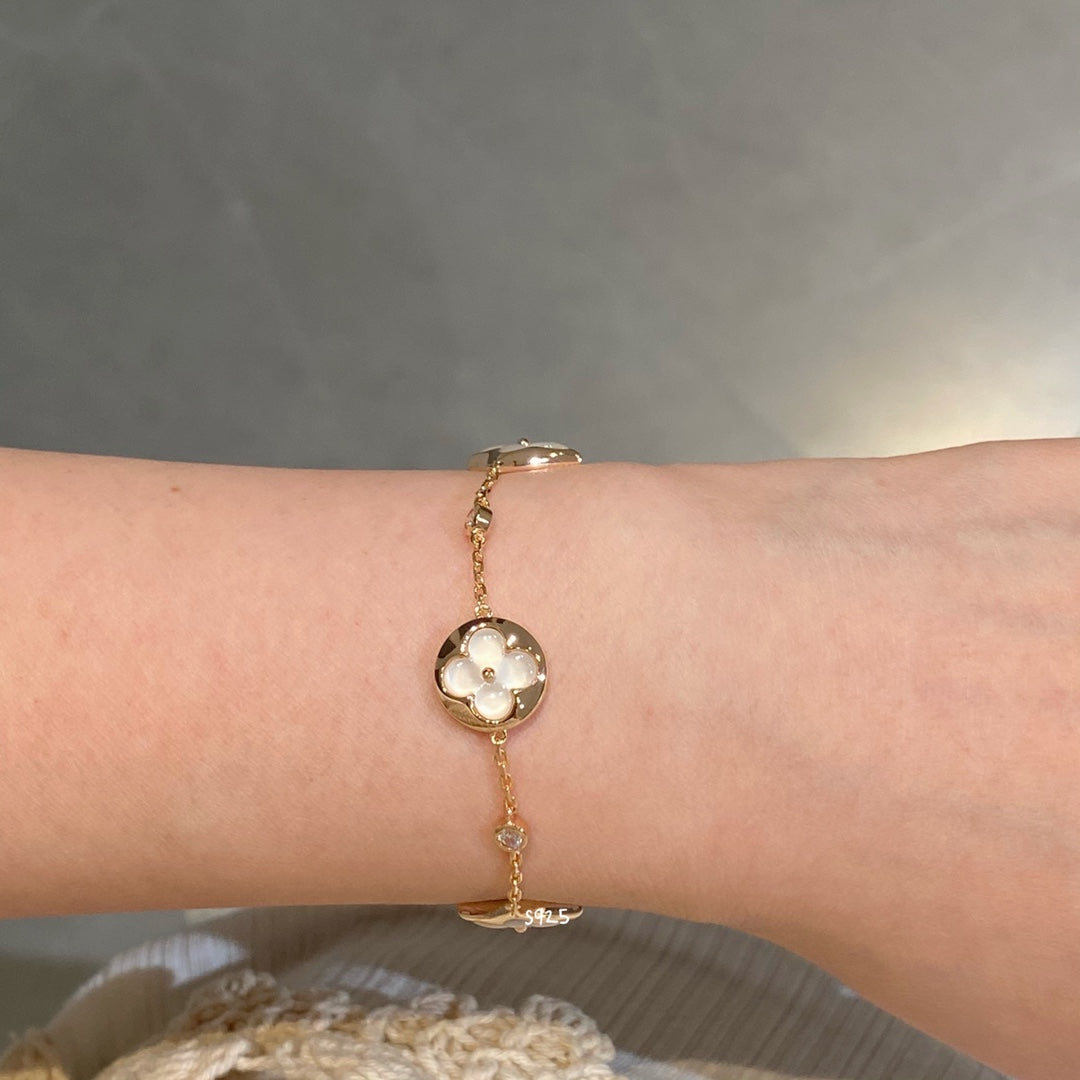 Lumi® Armband mit Stern und Sonne, 4 Motive, weiß, rosa, goldfarben 