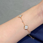 Lumi® Armband mit Stern und Sonne, 4 Motive, weiß, rosa, goldfarben 