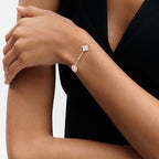 Lumi® Armband mit Stern und Sonne, 4 Motive, weiß, rosa, goldfarben 