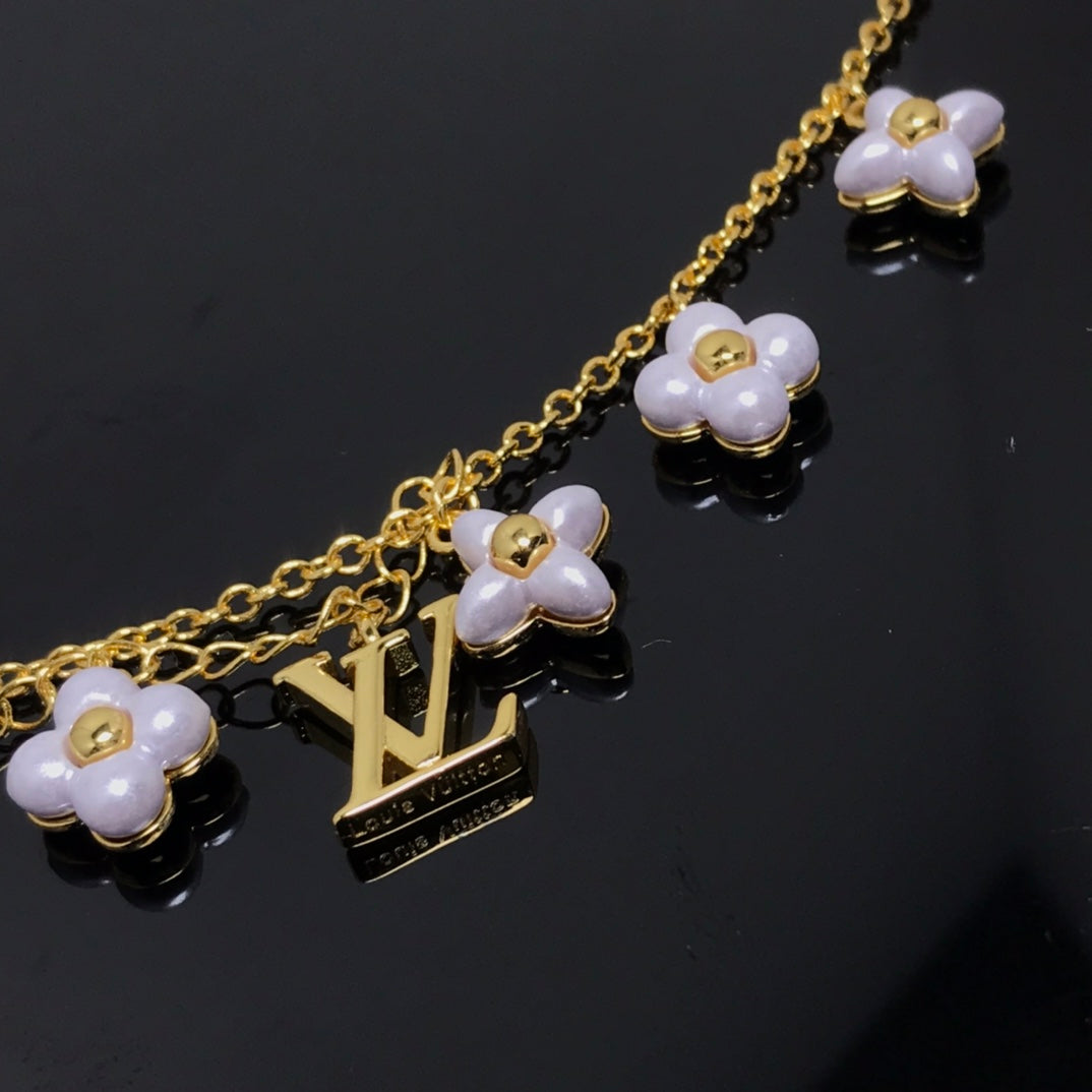 ¡®Lumi¡¯LOGO 6 MOTIF STAR AND SUN GOLD BRACELET