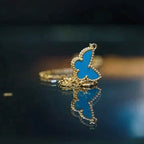 Lumi® Butterfly Türkisfarbenes Schmetterlingsarmband