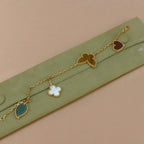 ¡®Lumi¡¯LUCKY SPRING 5 MOTIF GOLD BRACELET