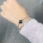 Lumi® CLOVER 5 MOTIF Armband aus geädertem Onyx, Silber
