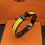 LumiCLIC HM SO SCHWARZ-GELBES ARMBAND