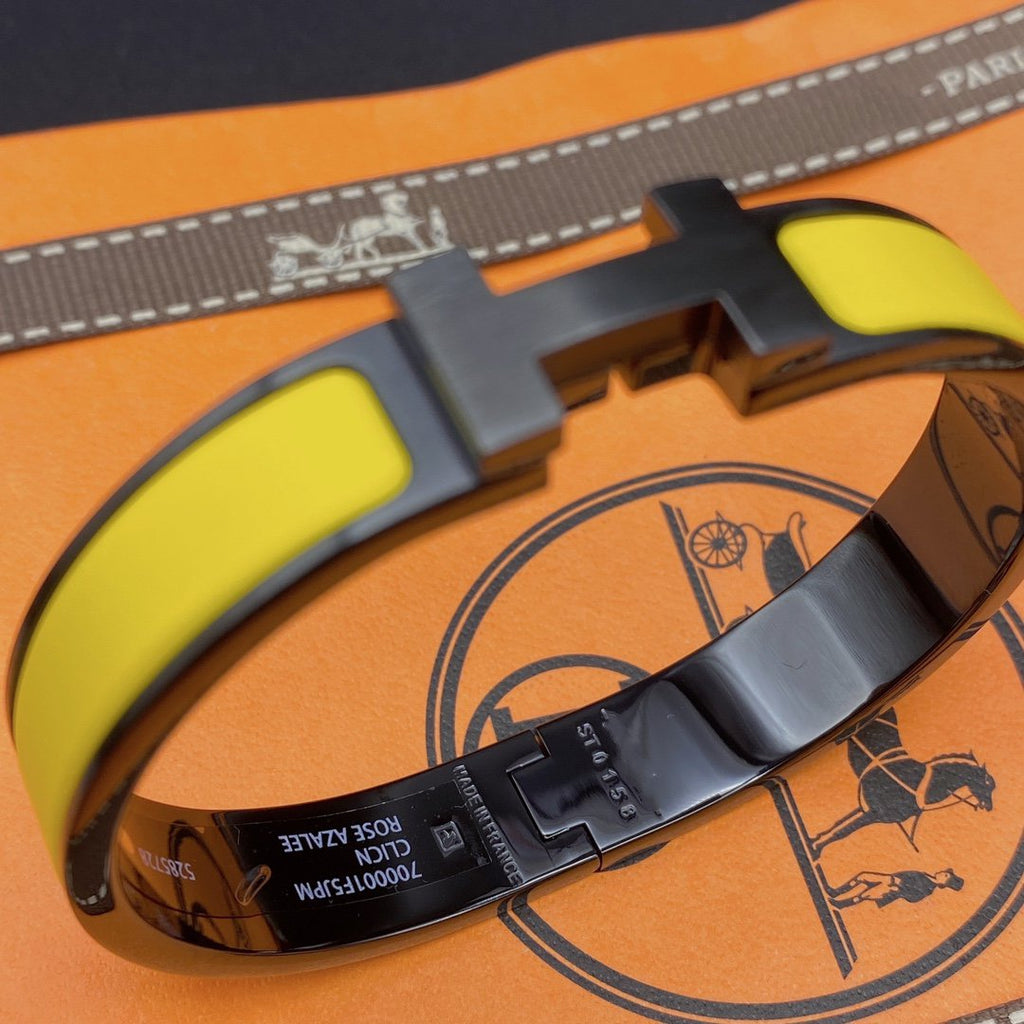 LumiCLIC HM SO SCHWARZ-GELBES ARMBAND