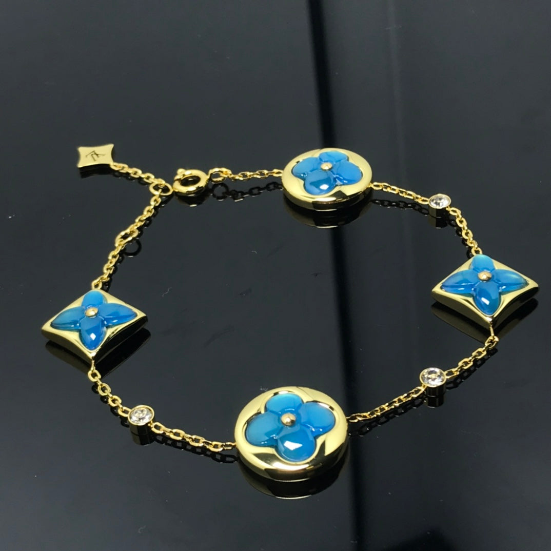¡®Lumi¡¯STAR AND SUN 4 MOTIF BLUE BRACELET