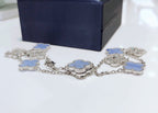Lumi® Kleeblatt-Halskette mit 10 Motiven, Chalkedon, Diamanten und Silber