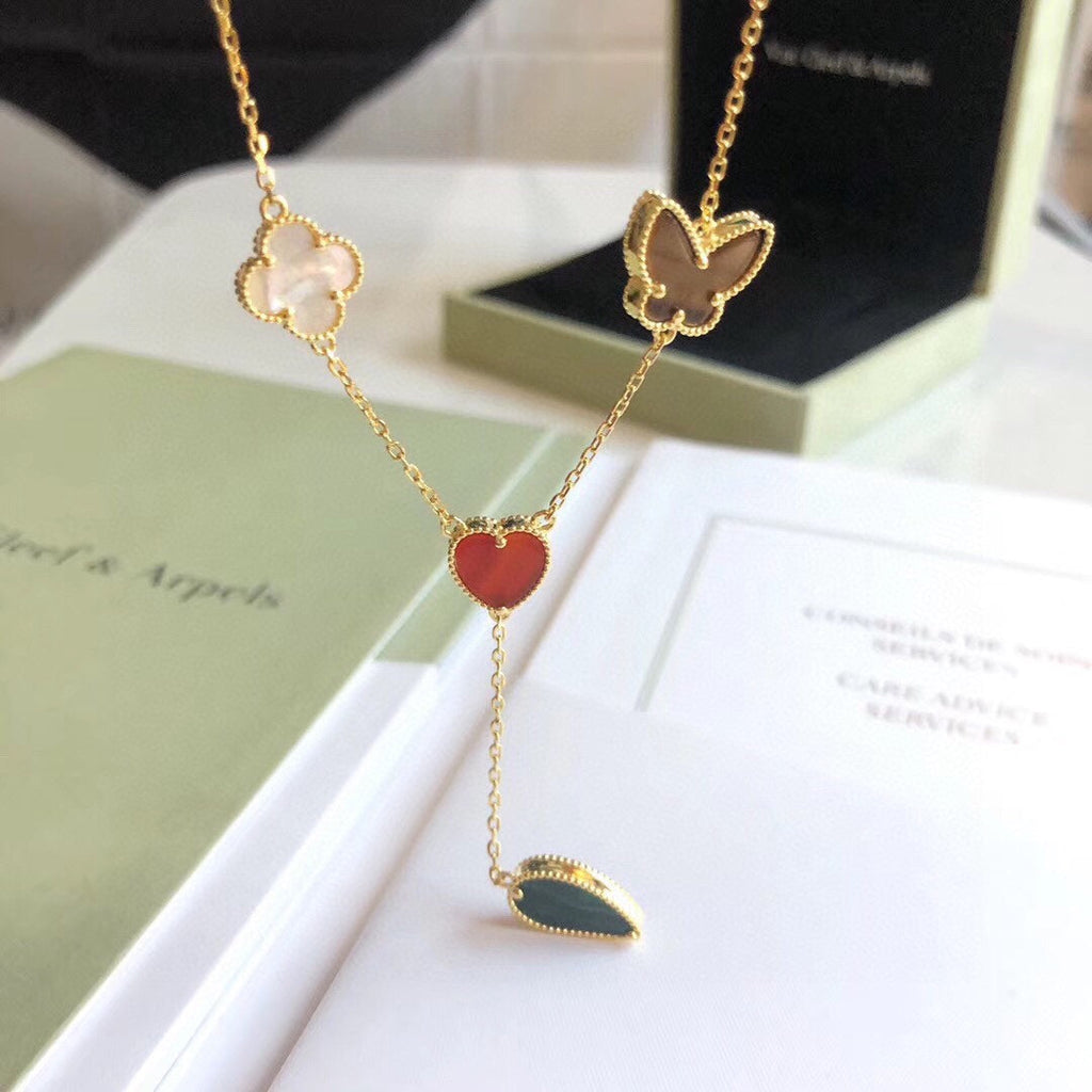 Lumi® Glücksfrühling Halskette mit 4 Motiven in Roségold
