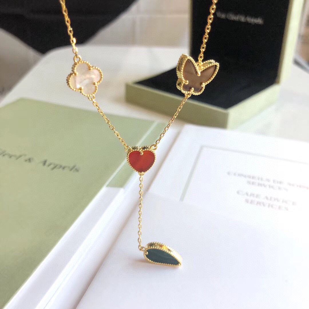 Lumi® Glücksfrühling Halskette mit 4 Motiven in Roségold
