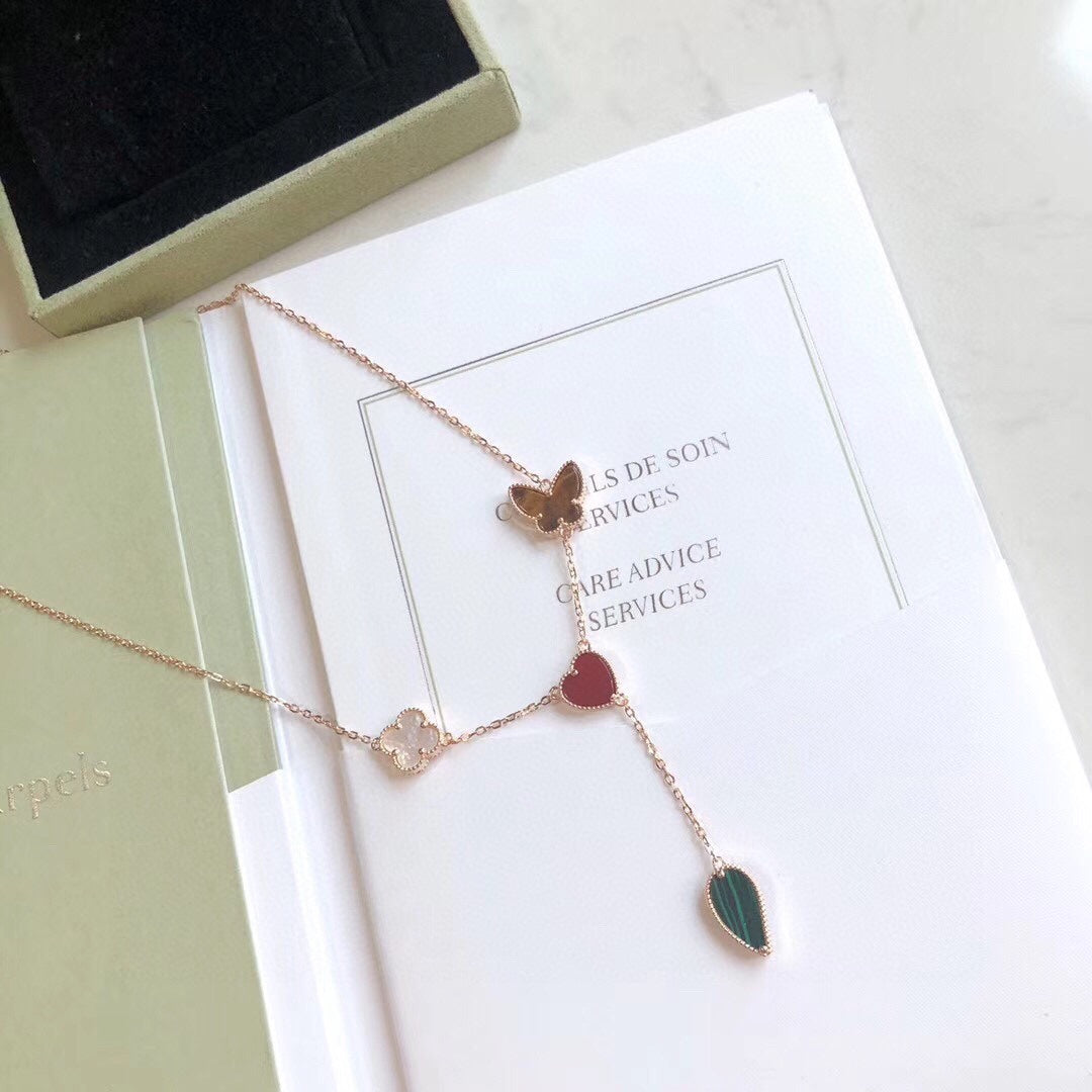 Lumi® Glücksfrühling Halskette mit 4 Motiven in Roségold