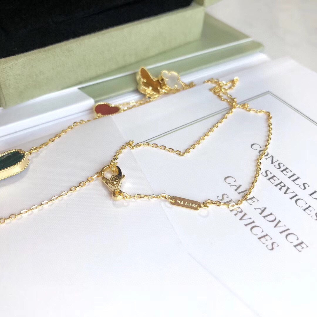 Lumi® Glücksfrühling Halskette mit 4 Motiven in Roségold