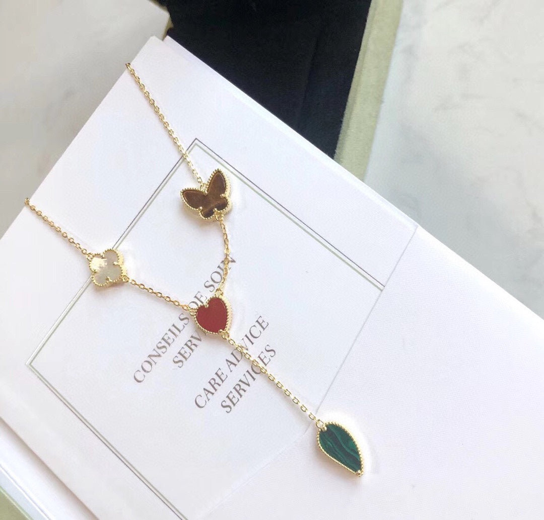 Lumi® Glücksfrühling Halskette mit 4 Motiven in Roségold